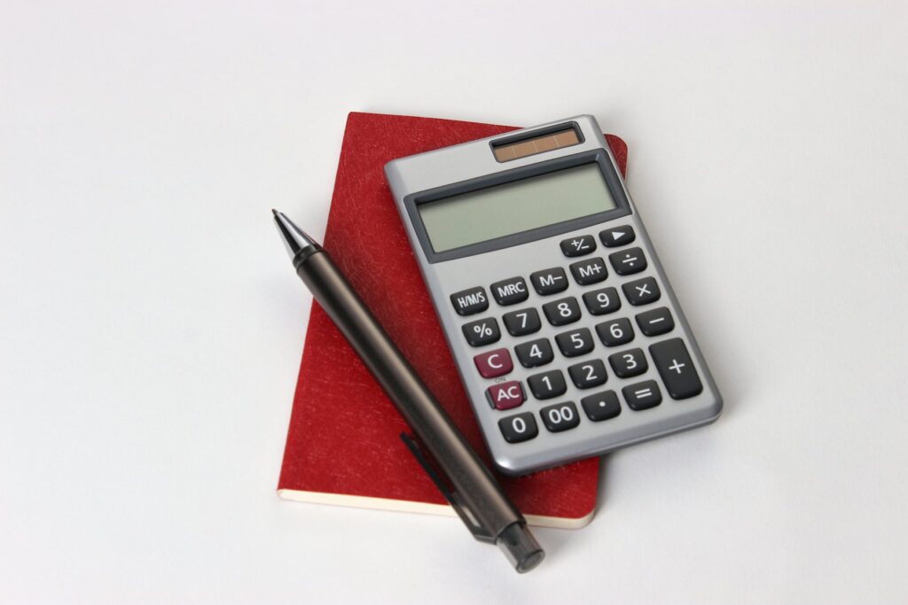 Calculator with paperwork