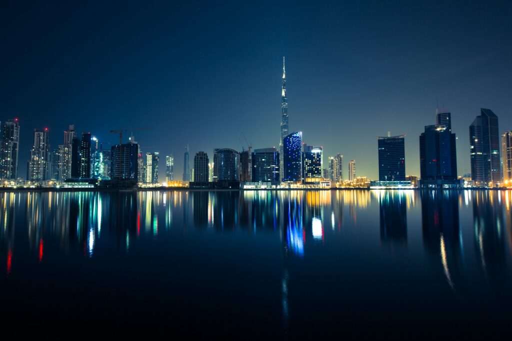 Dubai skyline reflected at night